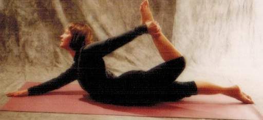 Ardha Dhanurasana, the half bow pose