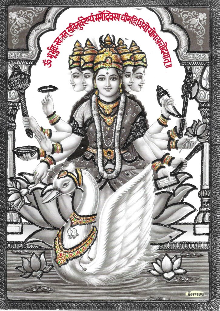 Goddess Gayatri has the mantra in a halo around her head.